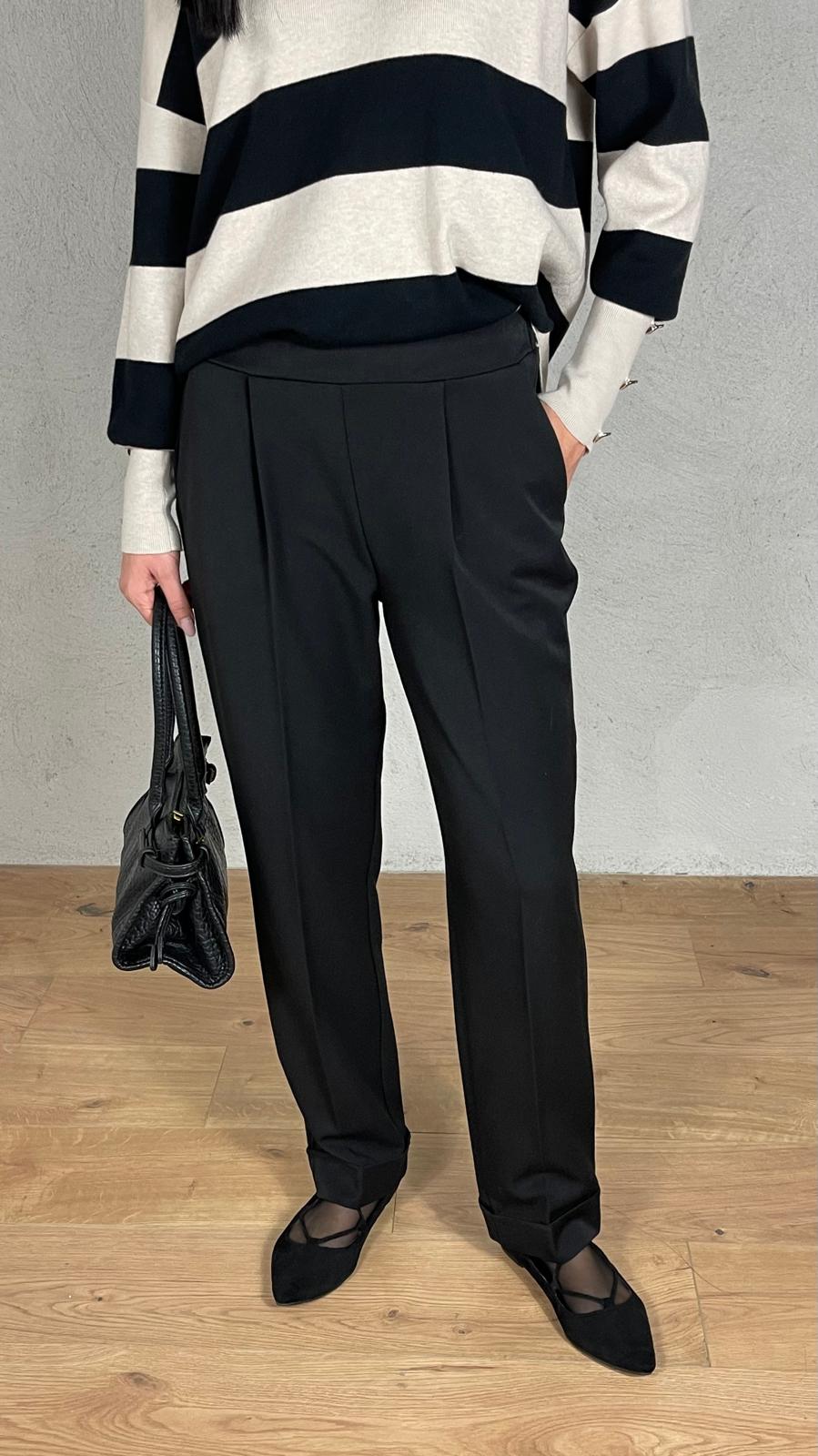 Pantalone a sigaretta con risvolto