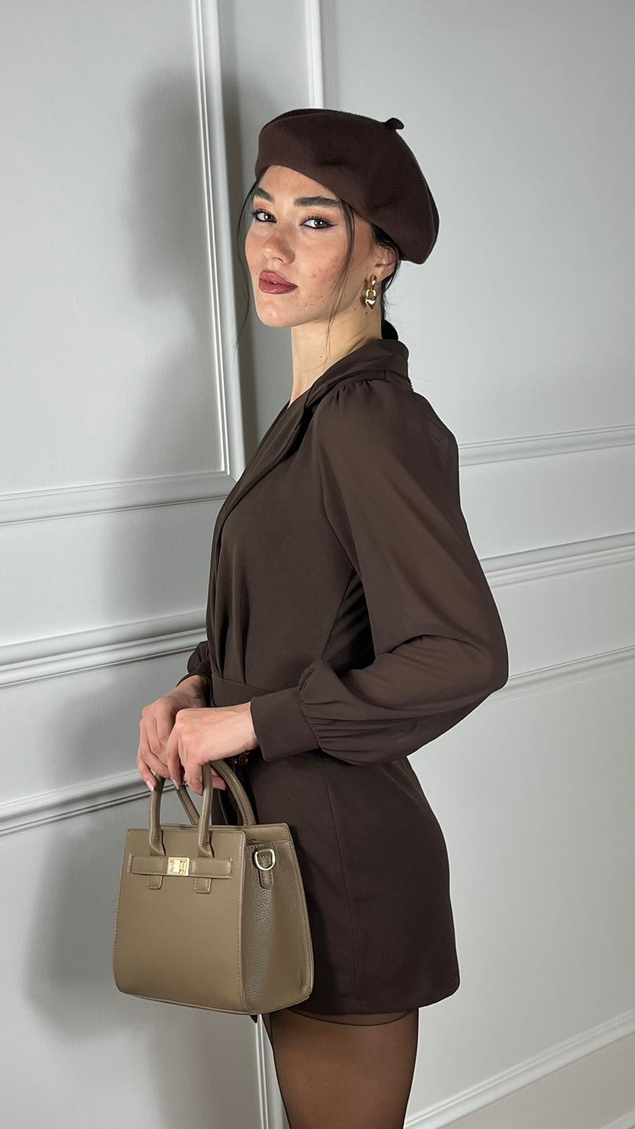 Tuta con accessorio oro