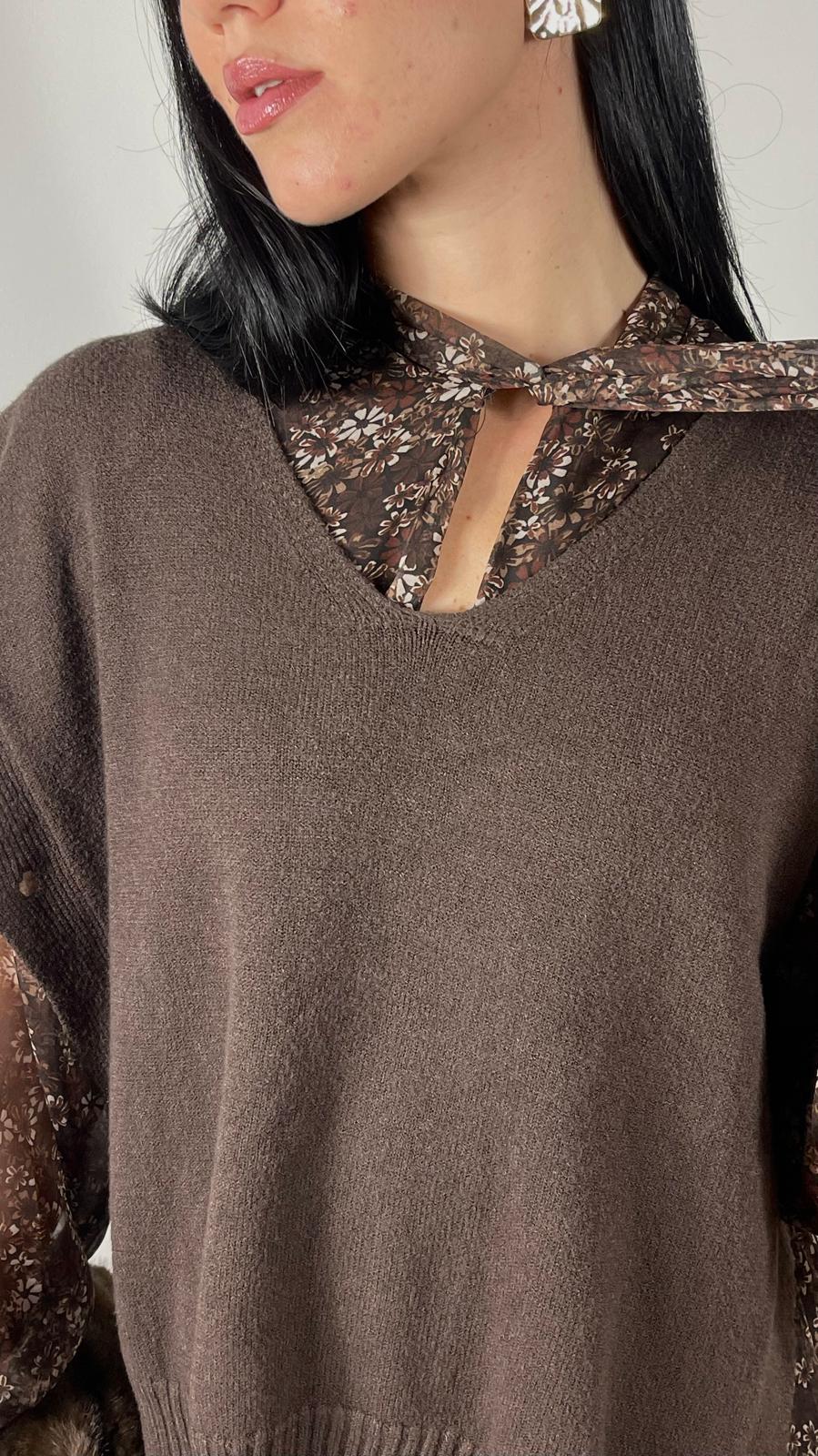 Gilet con spacchi laterali