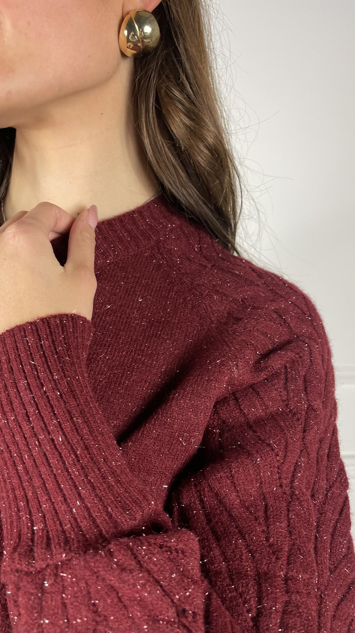 Maglione con treccia sulla spalla