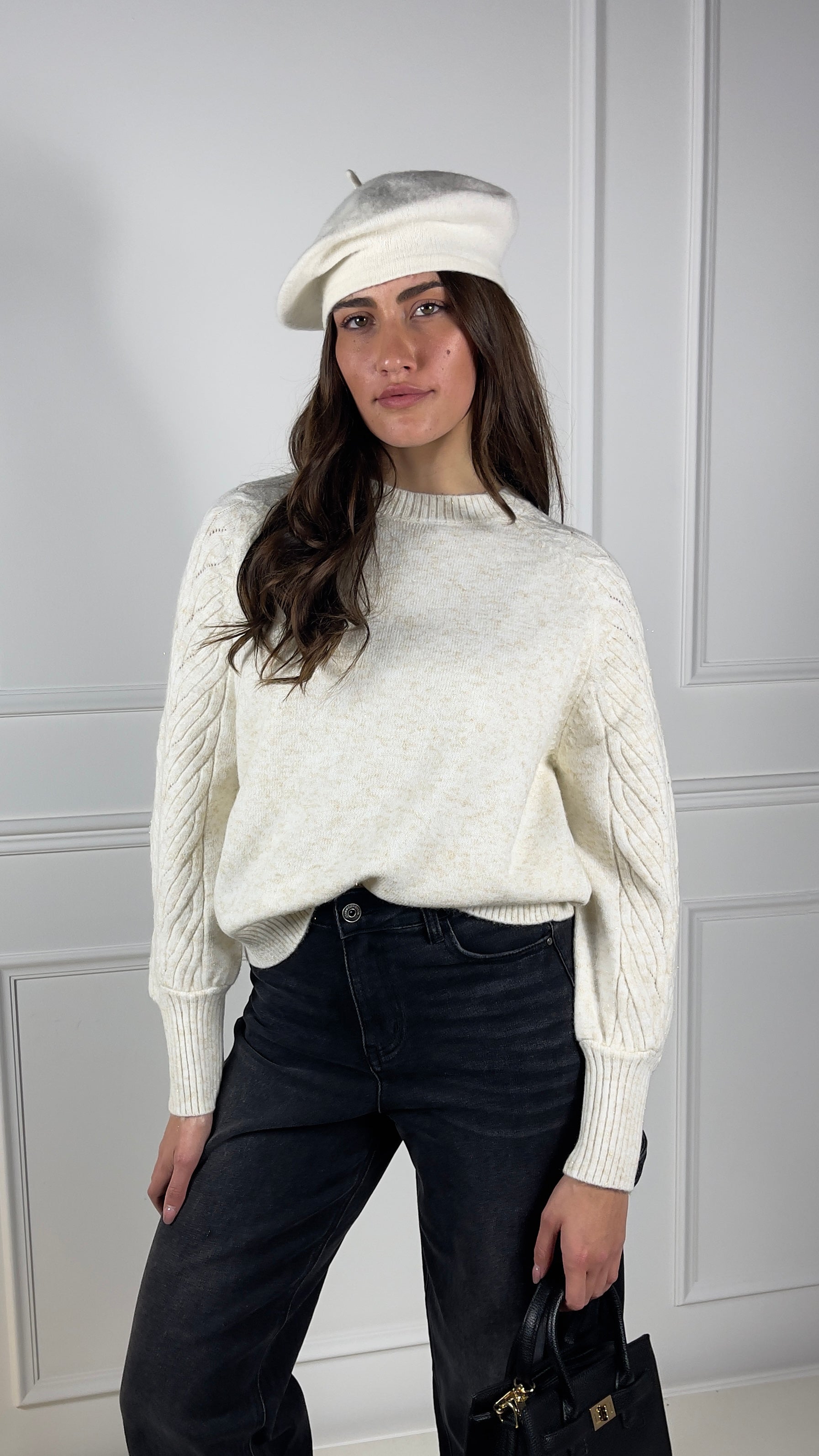 Maglione con treccia sulla spalla