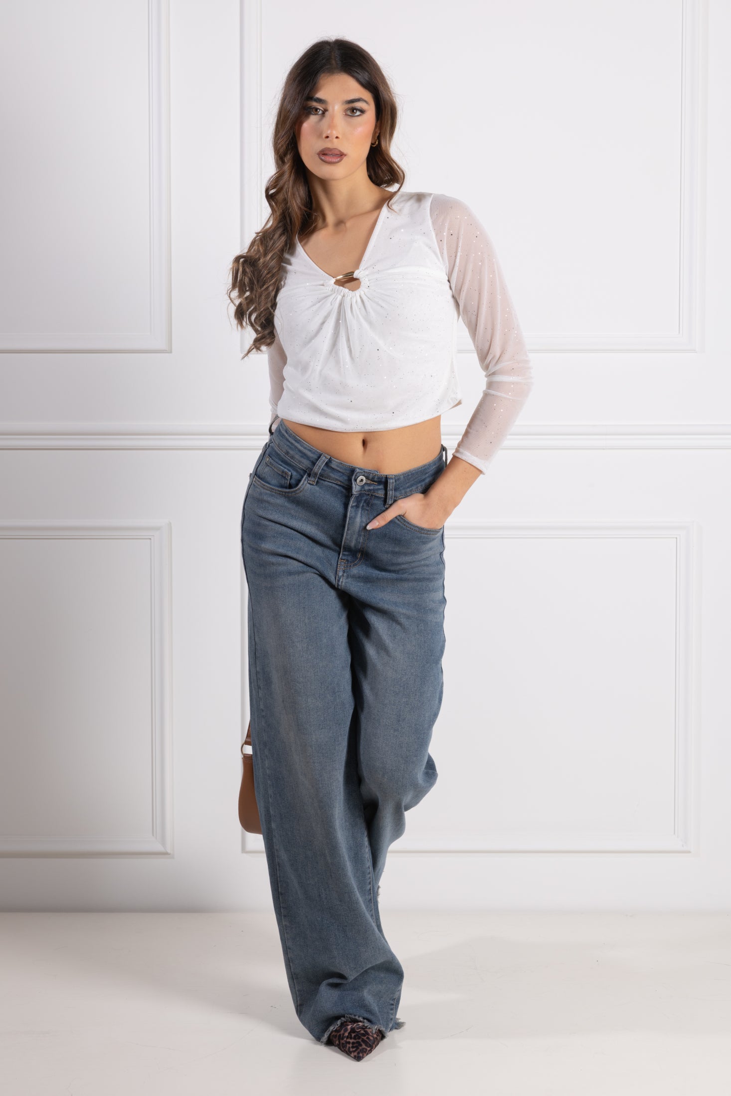 Blusa con accessorio a goccia