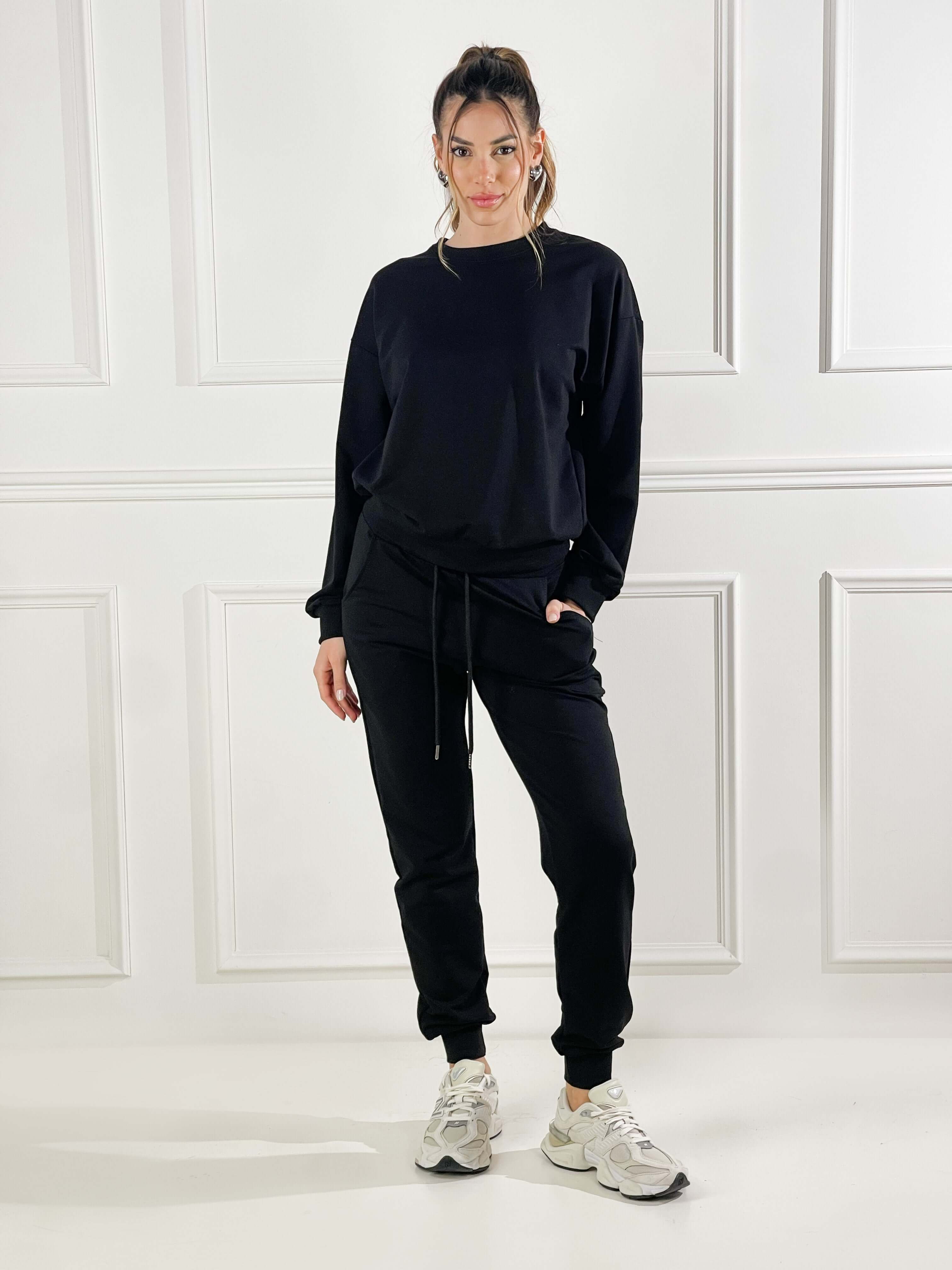 Pantalone in felpa con elastico alla caviglia|Colore:Nero