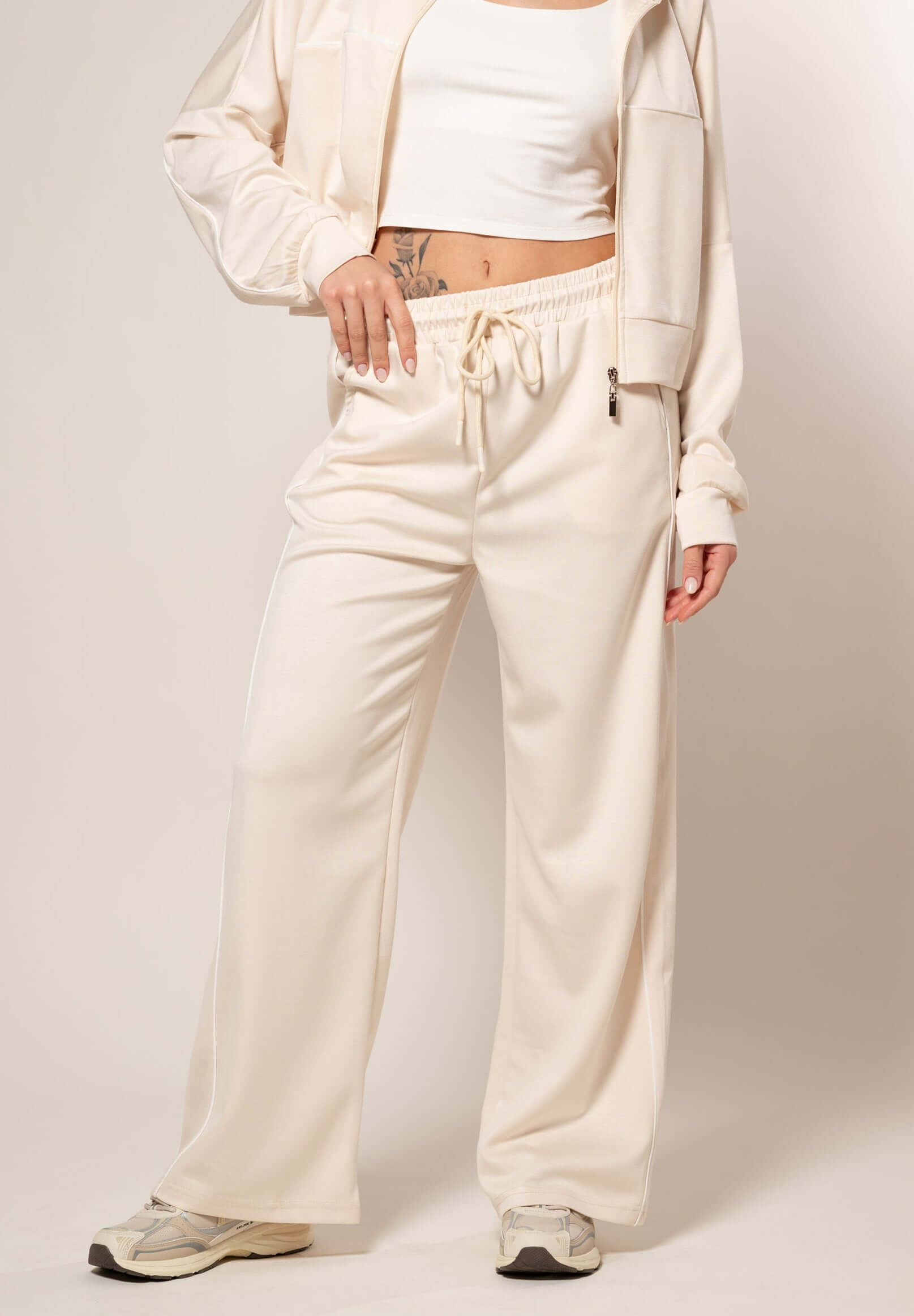 Tuta con profili a contrasto|Colore:Beige