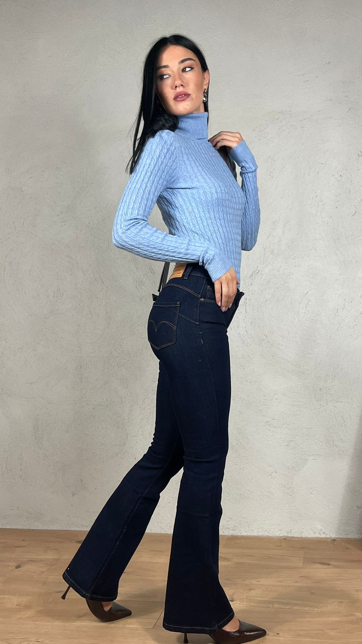 Maglia collo alto trecce