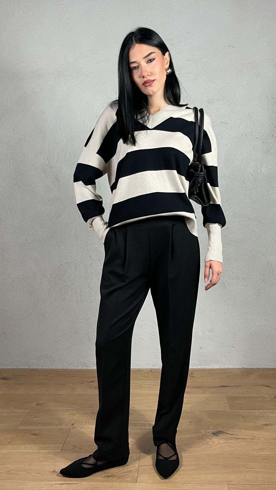 Pantalone a sigaretta con risvolto