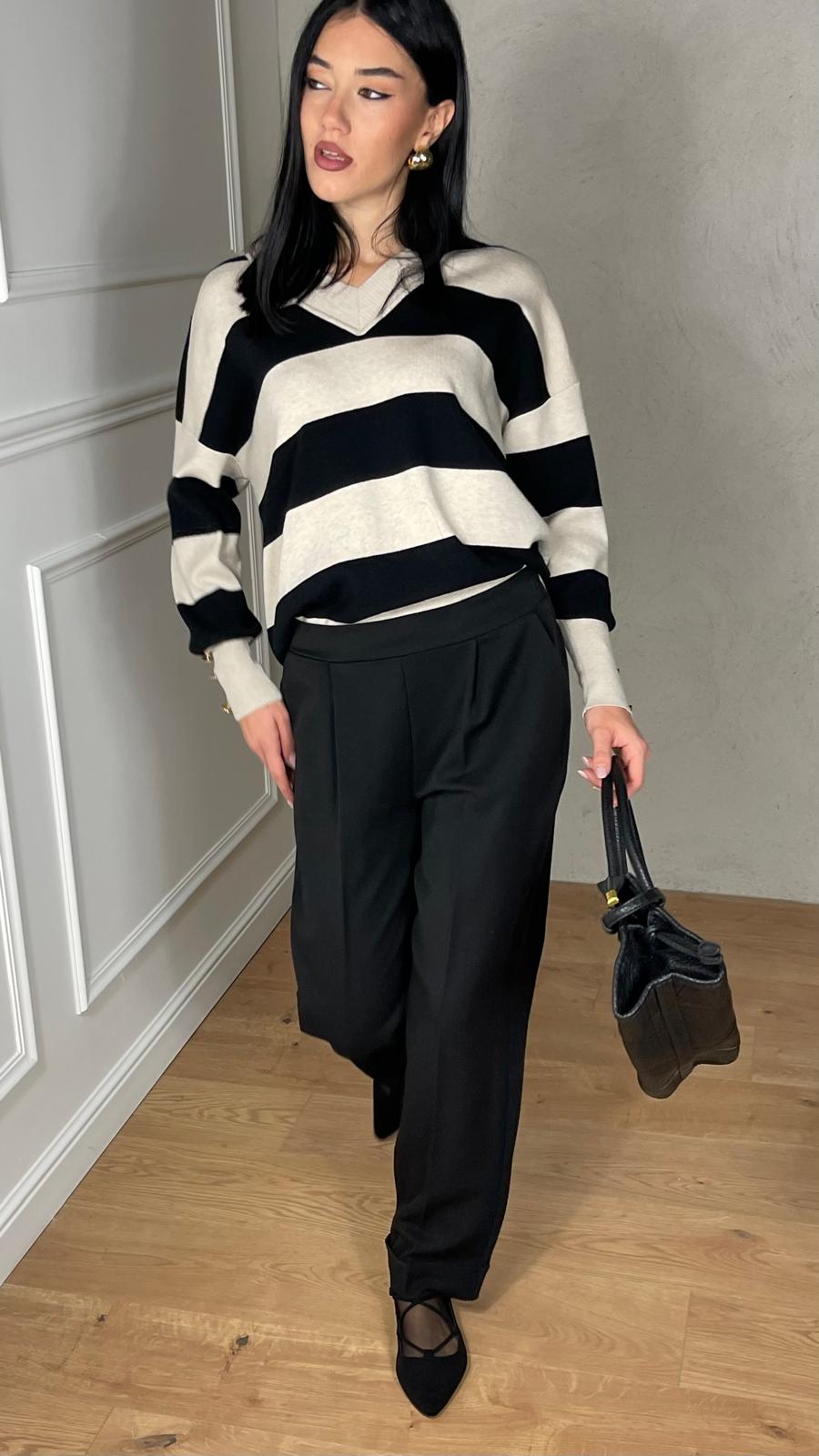 Pantalone a sigaretta con risvolto