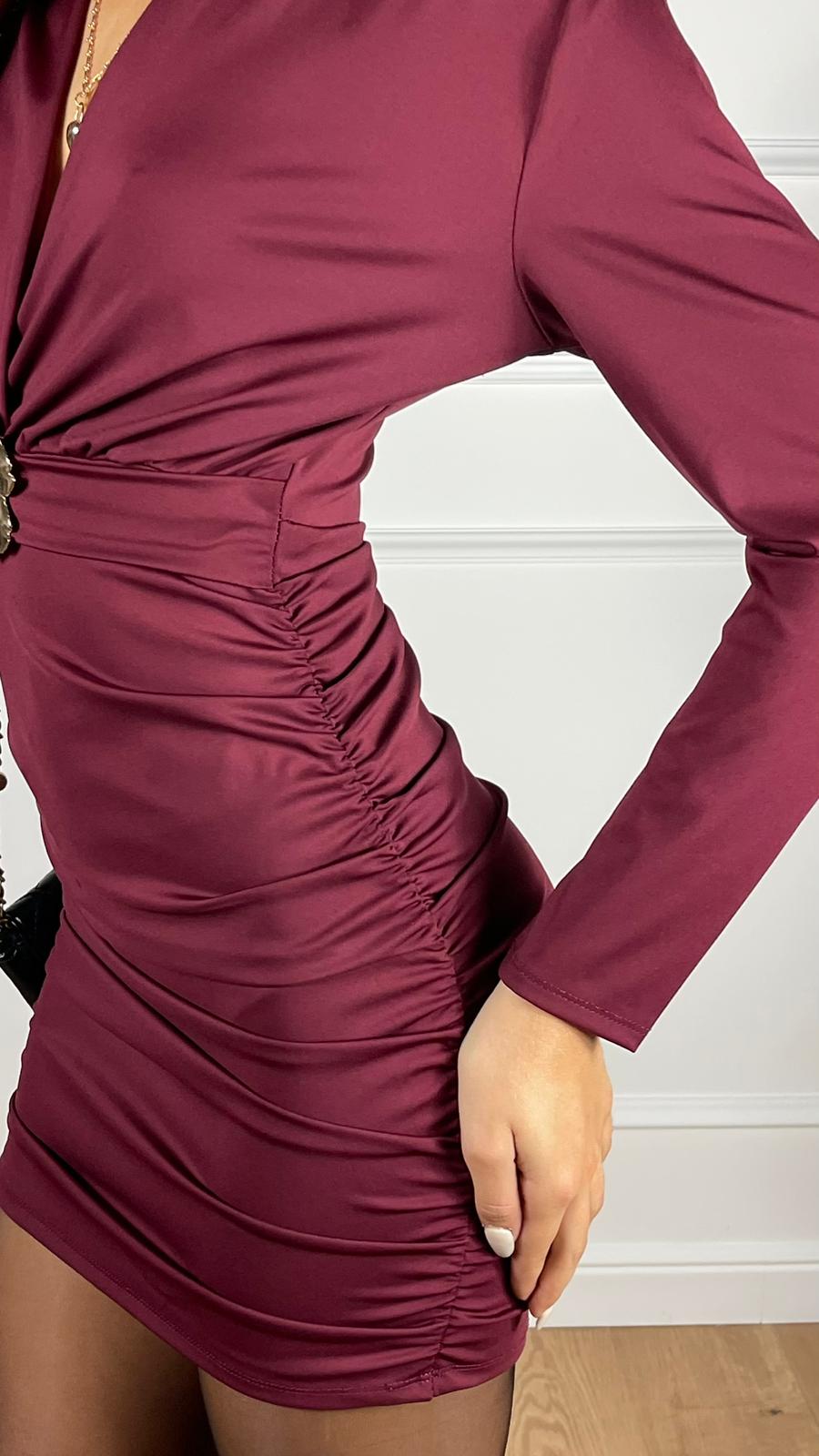 Miniabito con accessorio oro