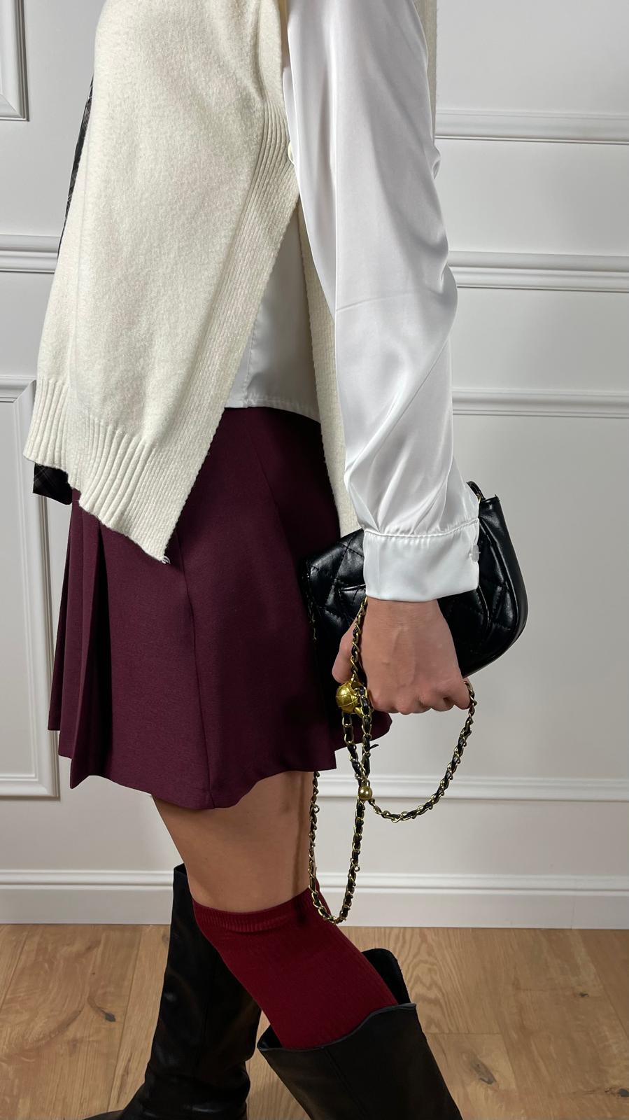 Gilet con spacchi laterali