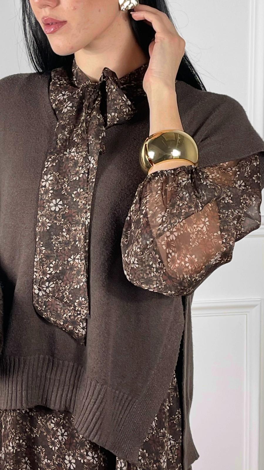 Gilet con spacchi laterali