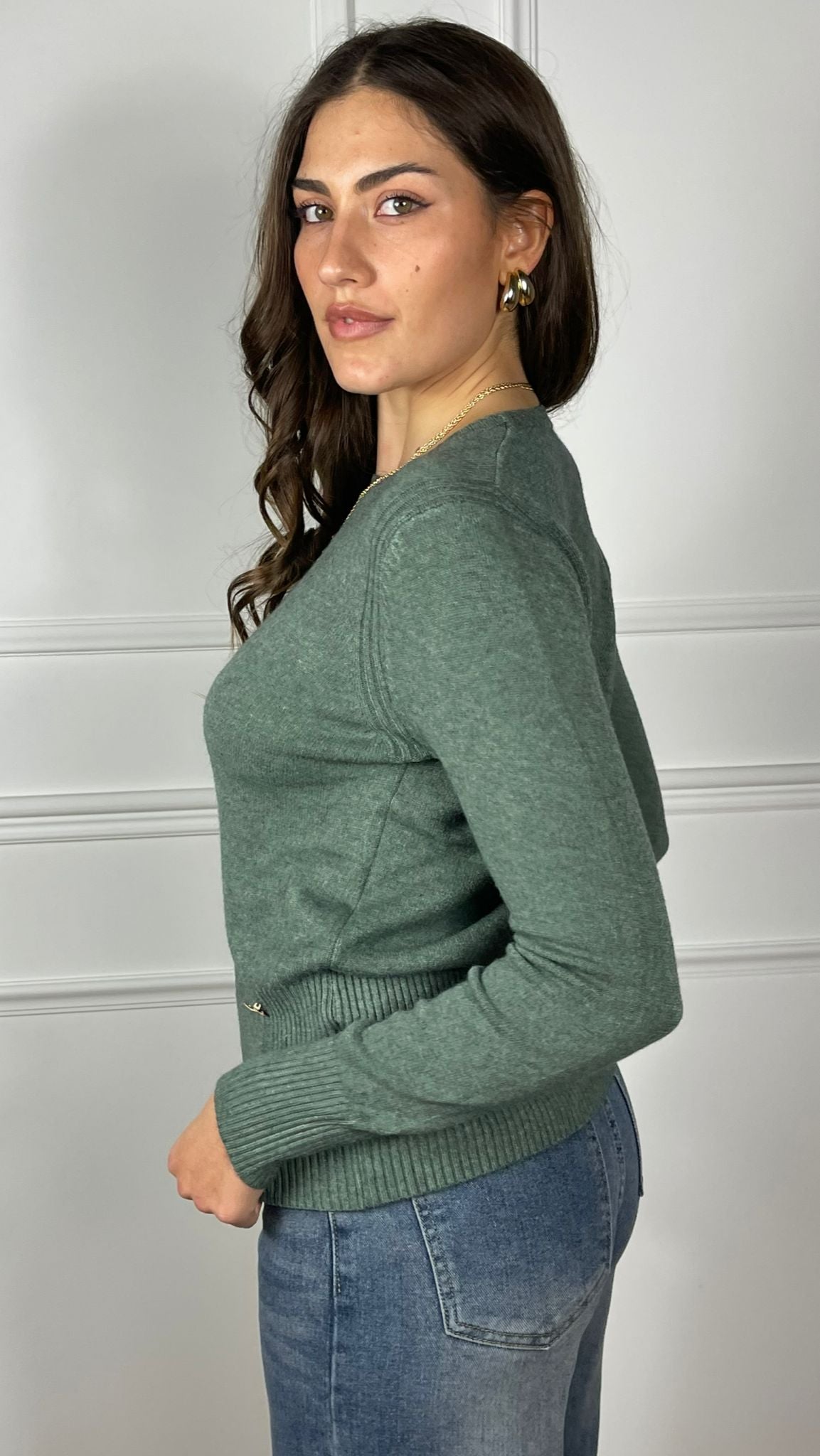 Maglia con accessorio esagonale