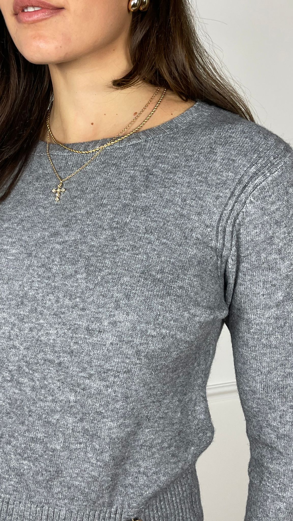 Maglia con accessorio esagonale