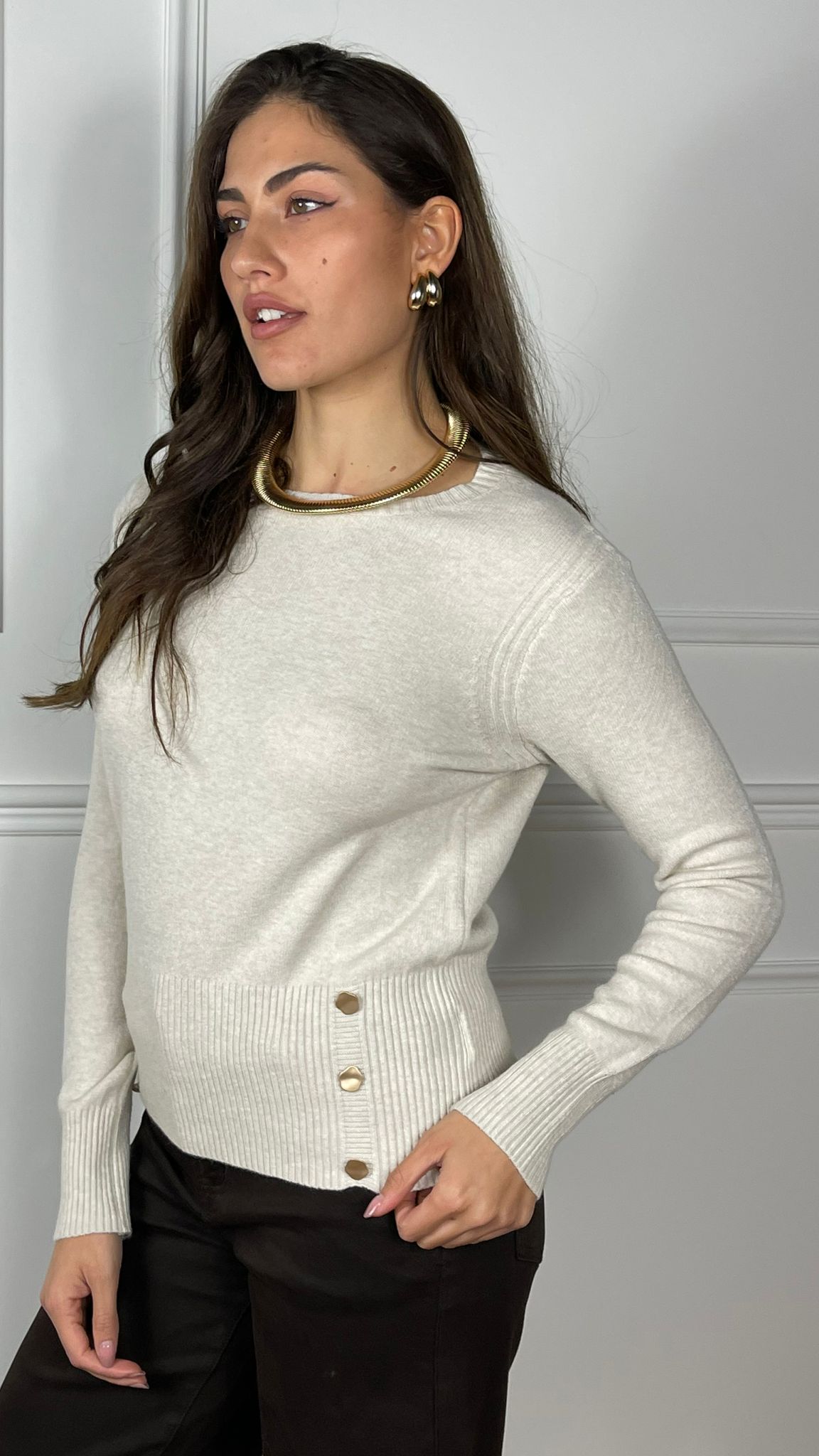 Maglia con accessorio esagonale