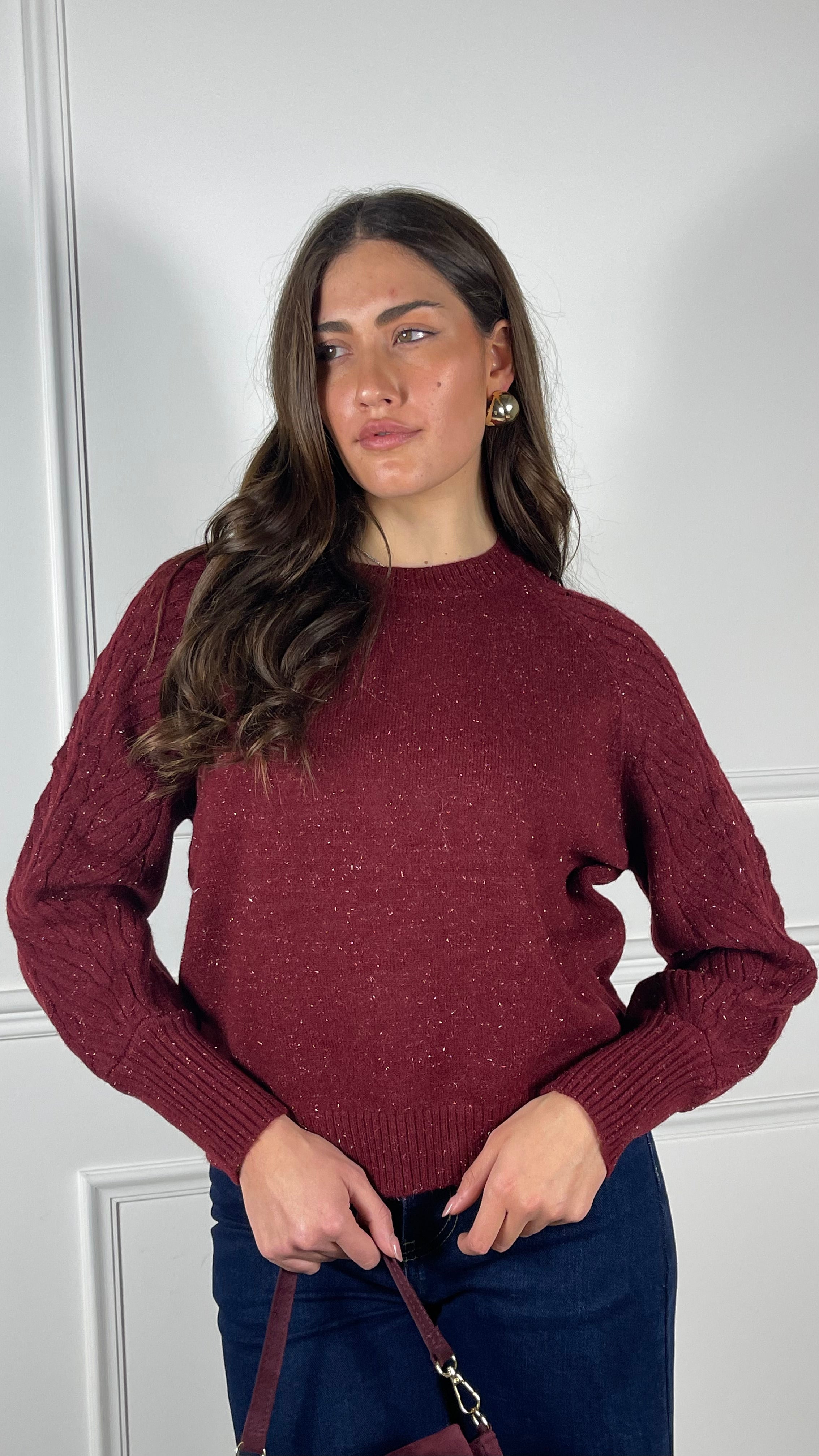 Maglione con treccia sulla spalla