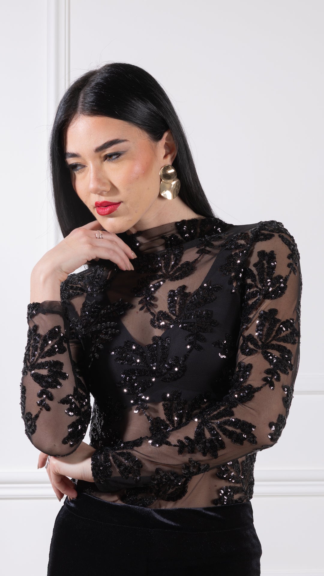 Maglia con applicazioni in paillettes