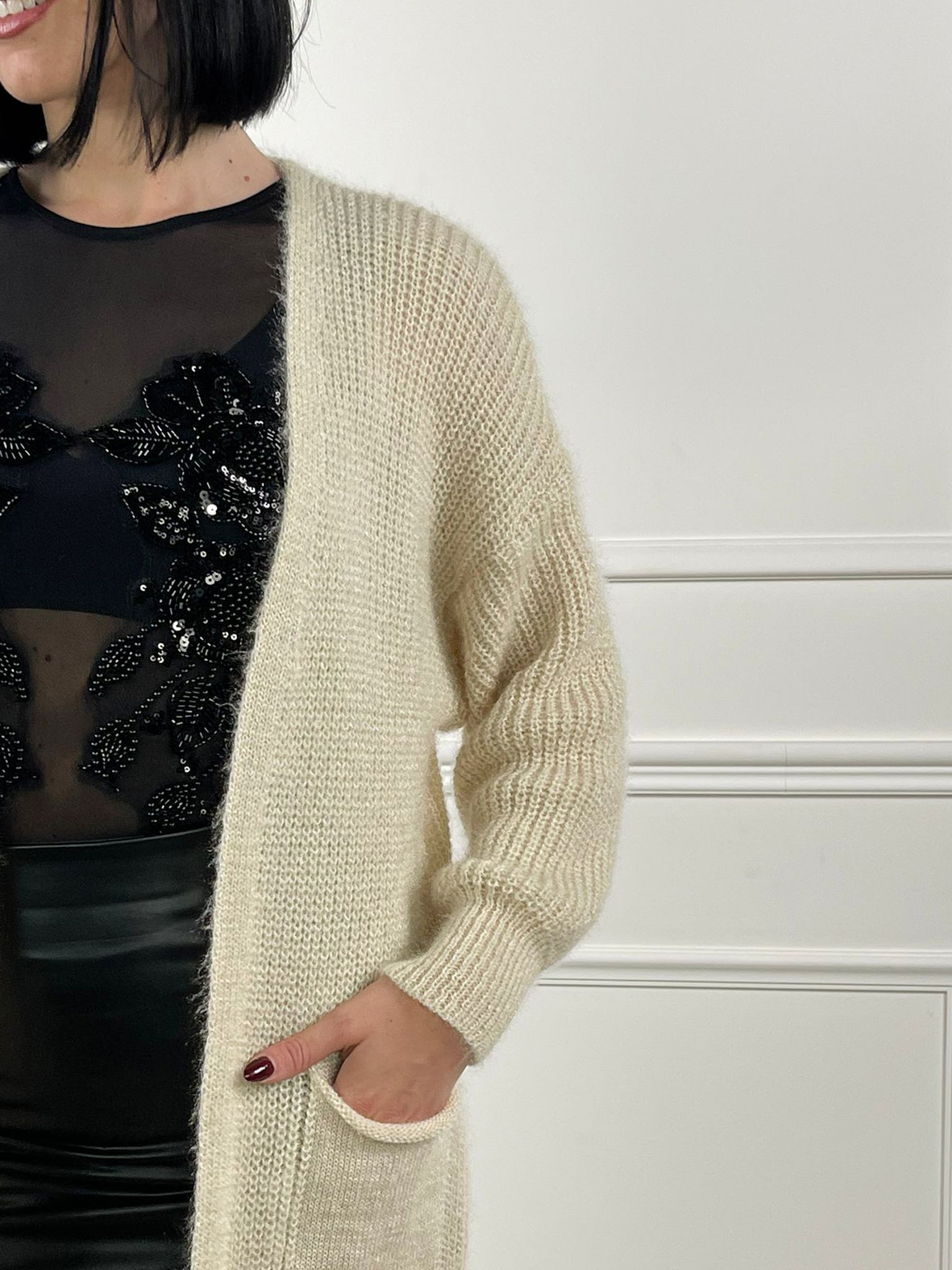 Cardigan con taschini