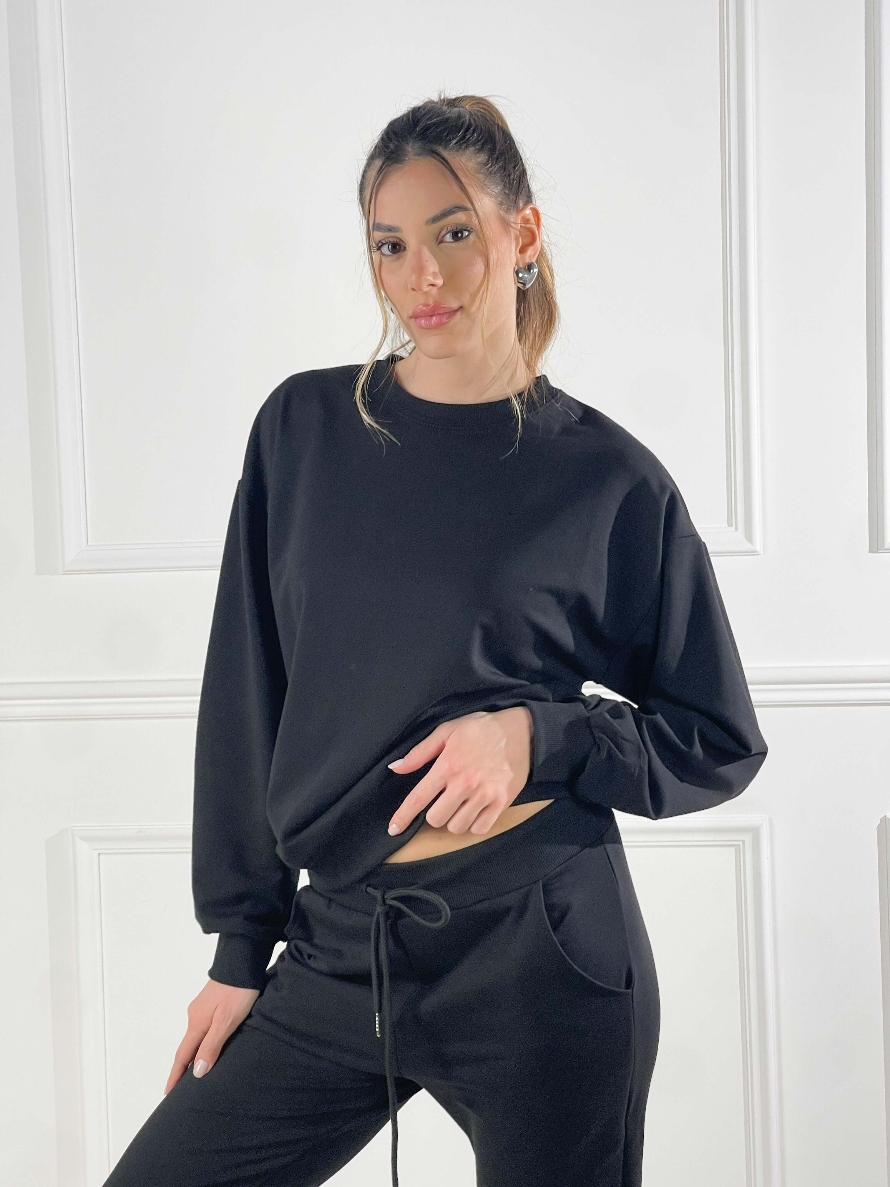 Pantalone in felpa con elastico alla caviglia|Colore:Nero