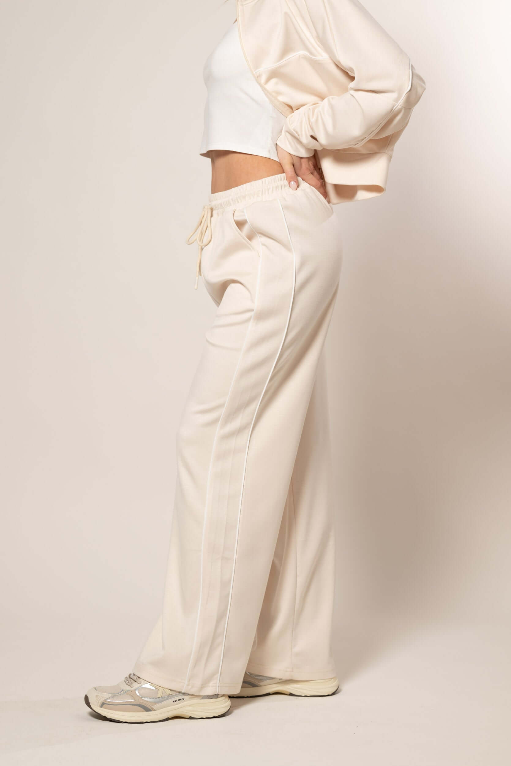 Tuta con profili a contrasto|Colore:Beige