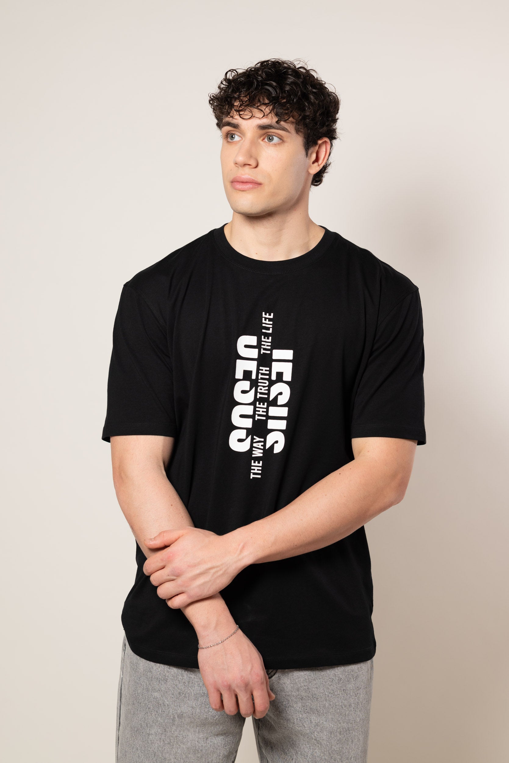 T-shirt bianca con stampa verticale sul petto.|Colore:Nero