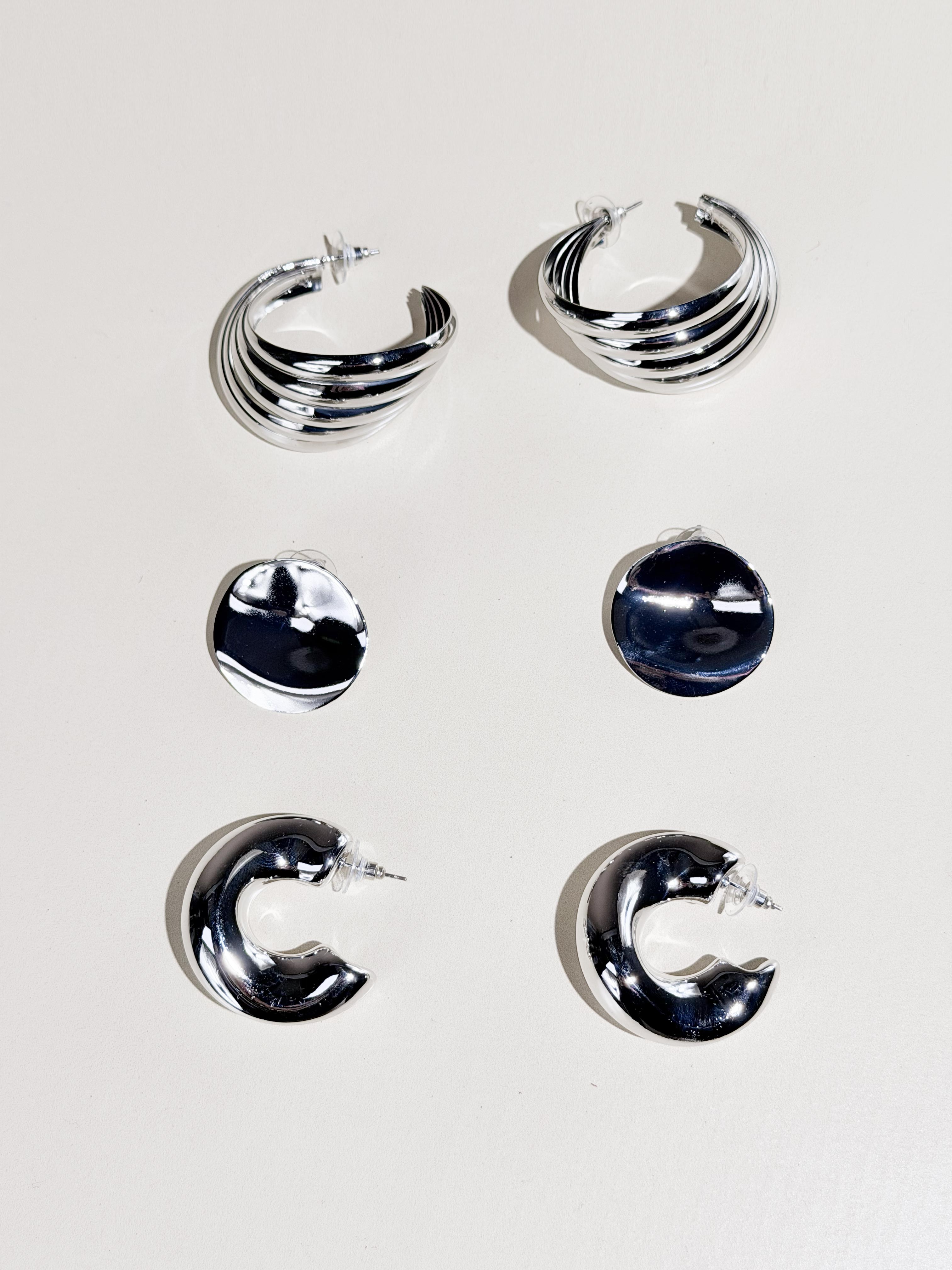 Tris cerchi avvolgenti|Colore:Argento