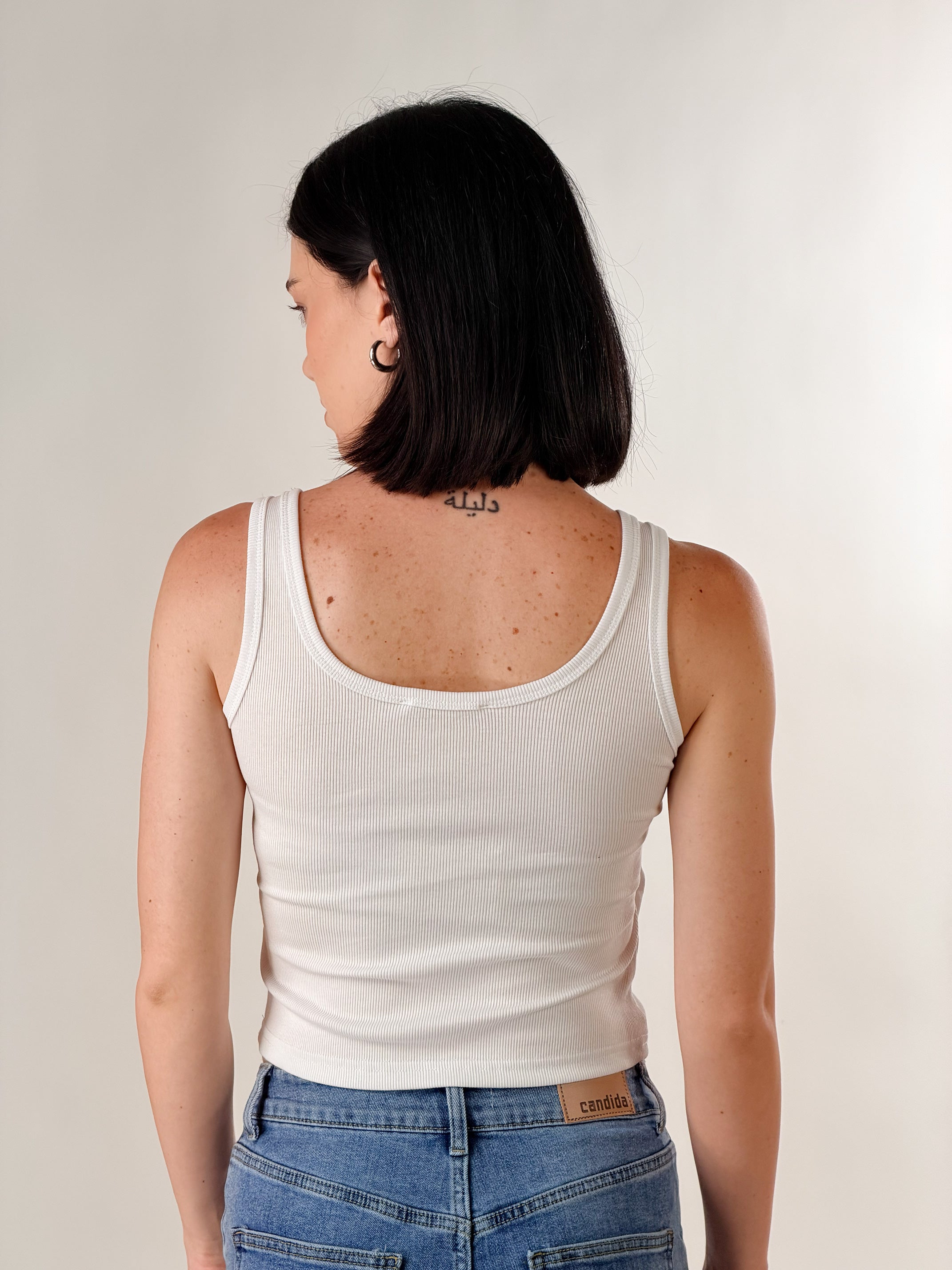 Top con fibbie|Colore:Bianco