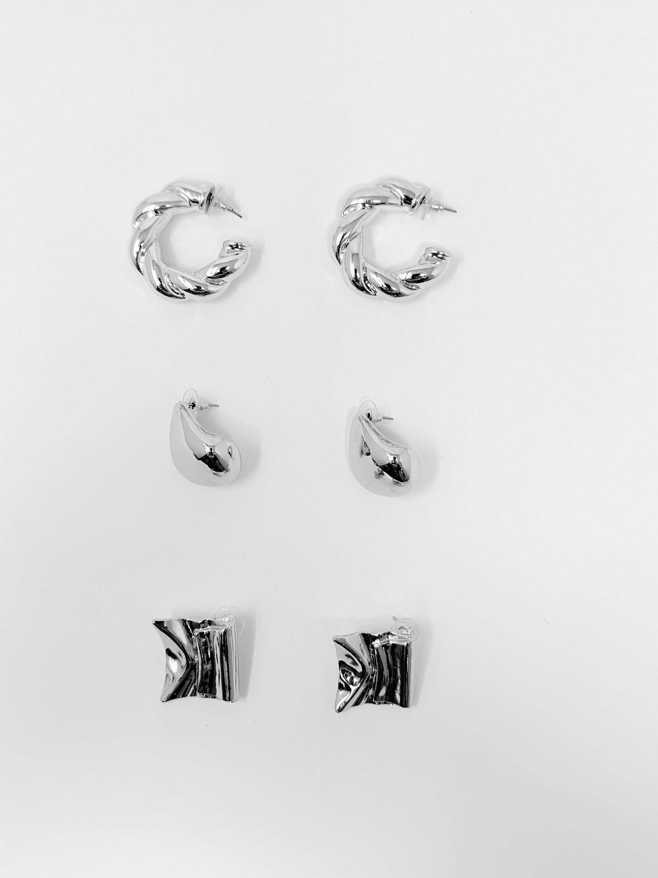 Tris orecchini varie forme|Colore:Argento